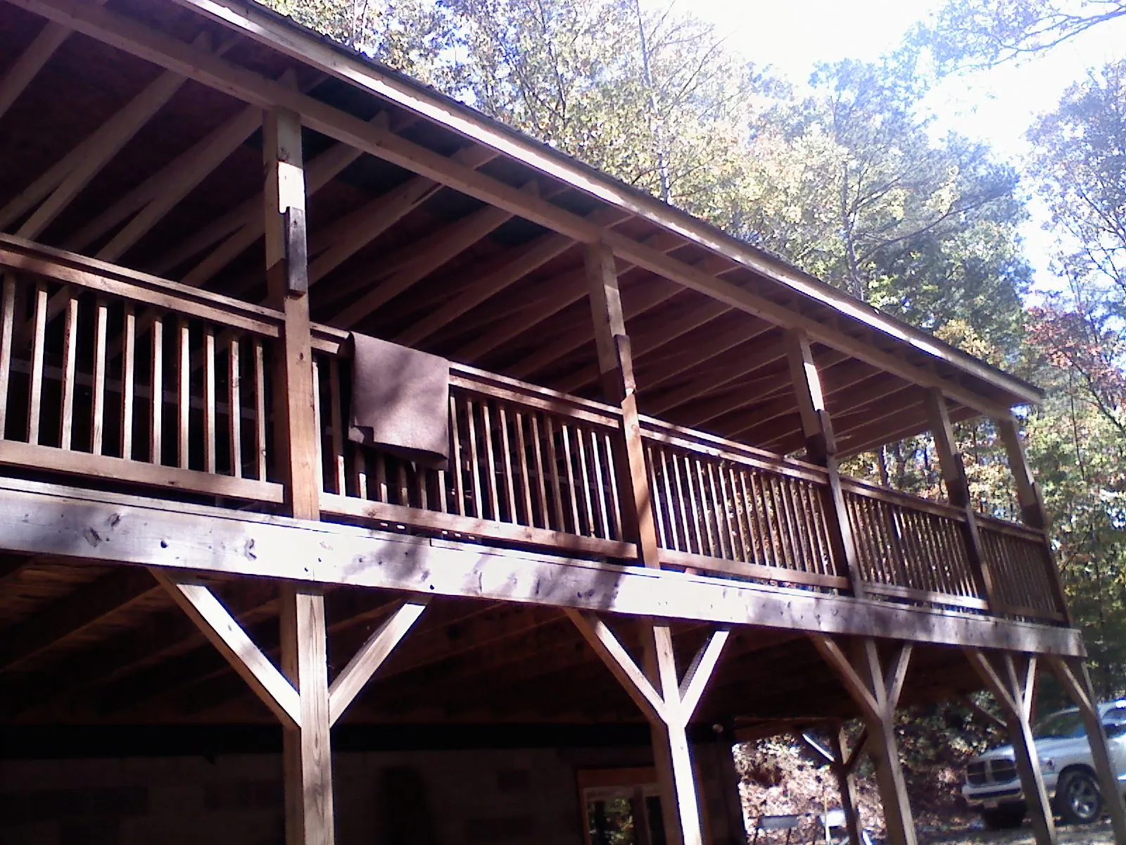 Timber framing under a new elevated porch and deck — Roof Leak Repair in Whitestone by Roofing Brothers